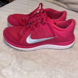 Nike Women's Pink Athletic Running Shoes with White Swoosh